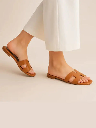 flats collection page women stylish flat sandals slip-on casual elegant everyday footwear collection.