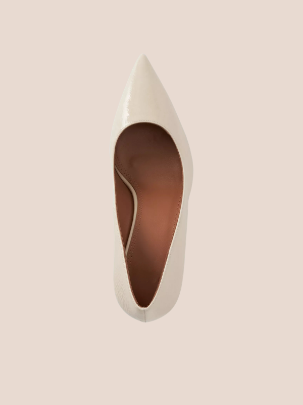 Ivory pointed toe block heels for women with a stylish cream finish.