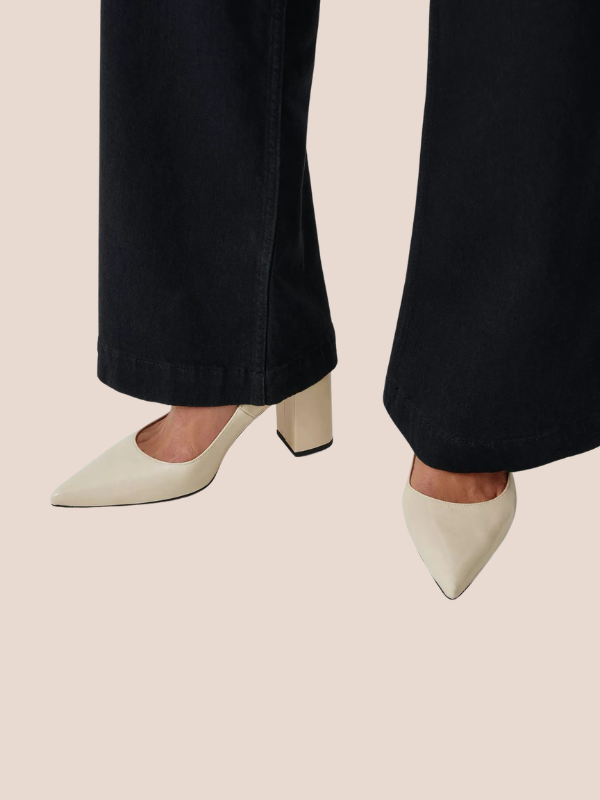 Ivory pointed toe block heels for women with a stylish cream finish.