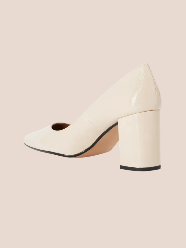 Ivory pointed toe block heels for women with a stylish cream finish.