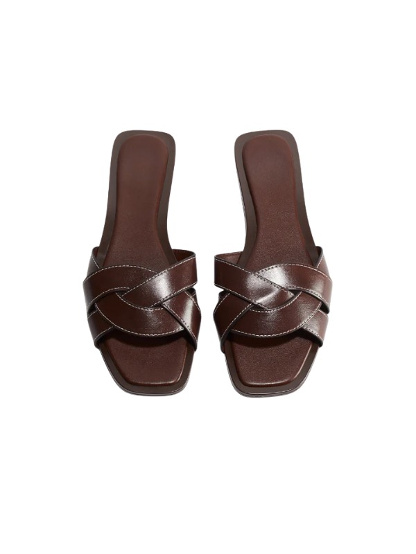 Luxury dark brown cross strap flat slippers for women with square toe, elegant minimalist slip-on sandals for casual wear.
