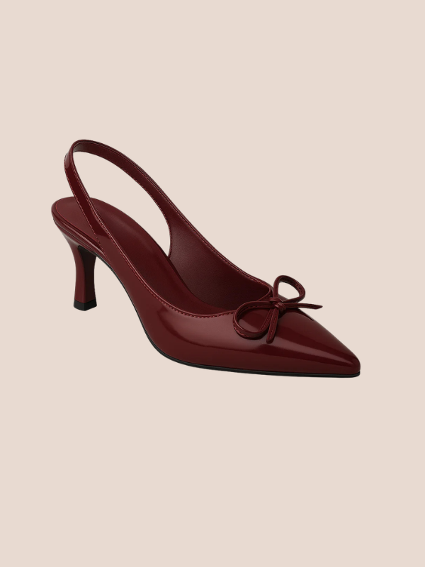 Maroon Dira Slingback Bow Pumps with glossy patent leather finish, pointed toe design, and adjustable slingback strap, featuring a decorative bow detail at the front, high stiletto heel.