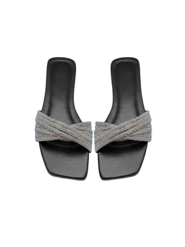Noir Glimmer black cross strap flats for women with crystal embellishment, square toe elegant slip-on sandals for casual and evening wear.