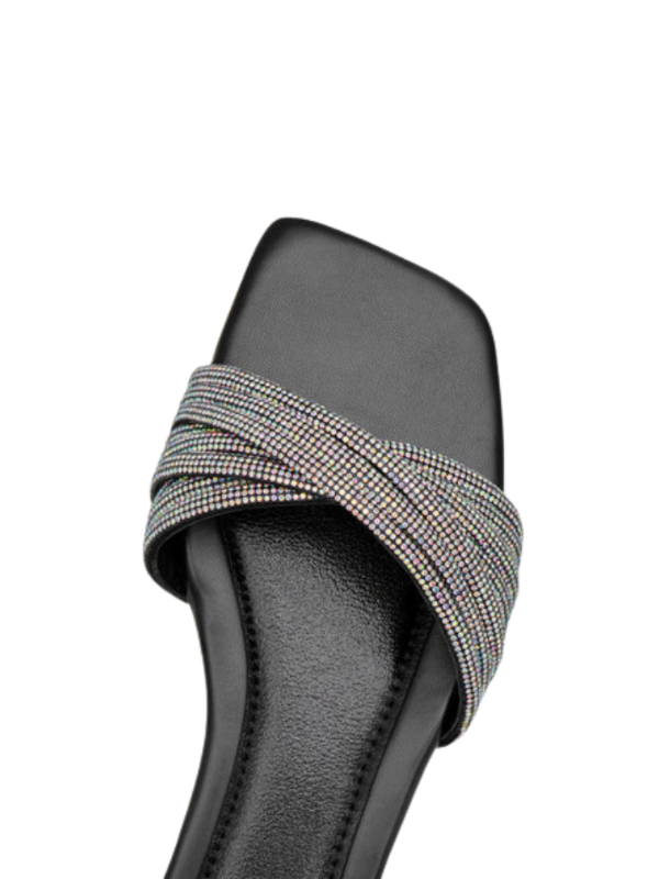 Noir Glimmer black cross strap flats for women with crystal embellishment, square toe elegant slip-on sandals for casual and evening wear.