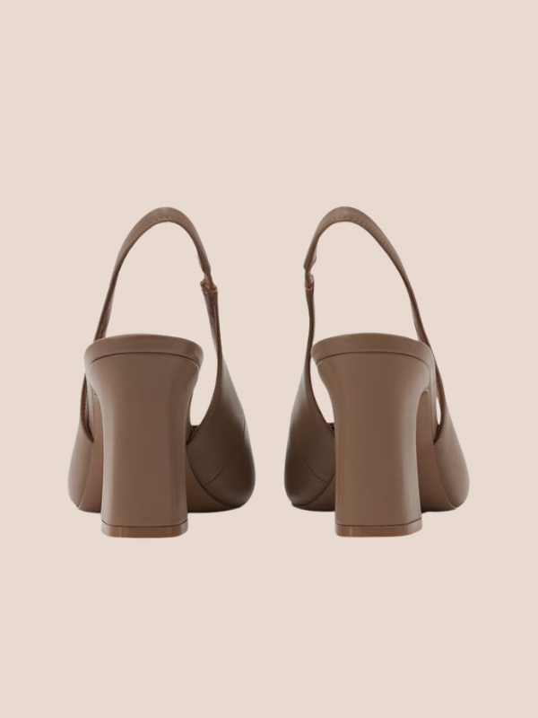 Nude brown pointed-toe slingback flats with a sleek slip-on design and open back strap.