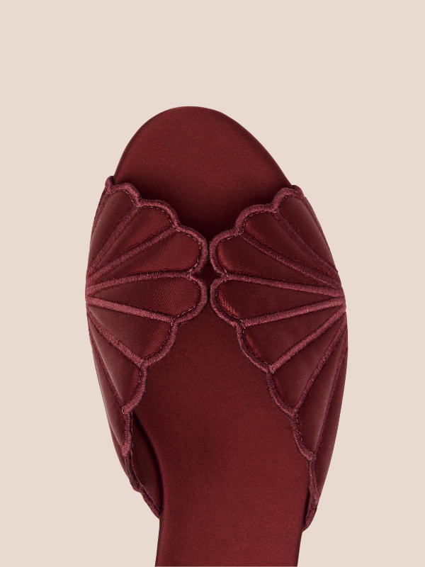Petale Bloom scalloped flat mules in maroon for women, elegant slip-on sandals with stylish cut design for casual and formal wear.