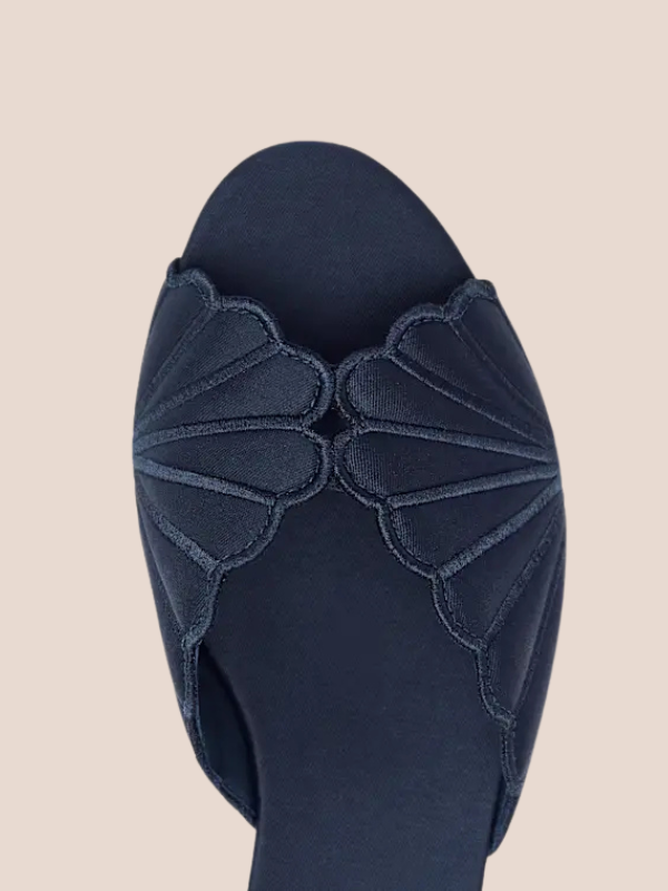 Petale Bloom scalloped flat mules in navy blue for women, elegant slip-on sandals with stylish cut design for casual and formal wear.